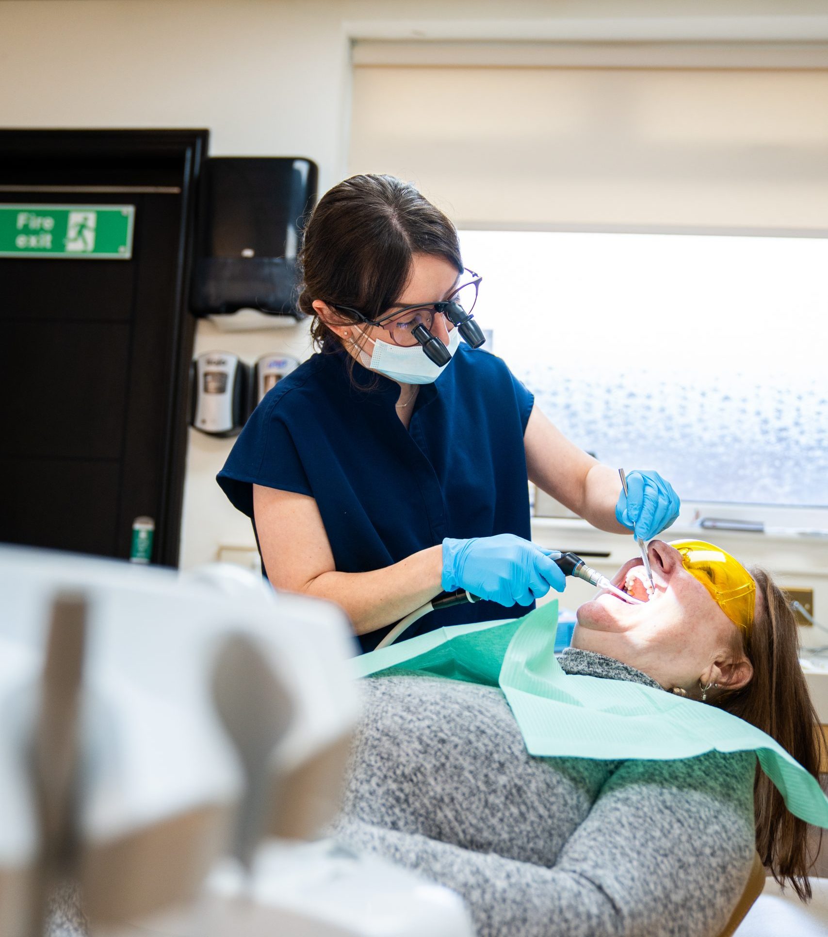 Dentist treating a patient at High Street Smiles in Golborne, Warrington
